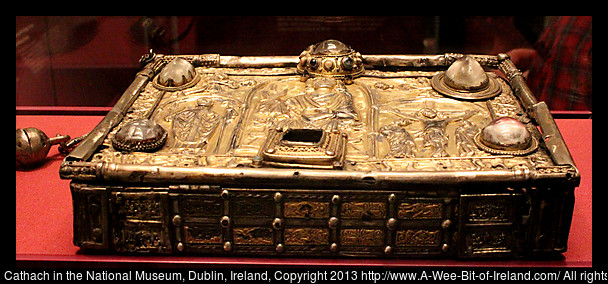 Gold box decorated with religious figures